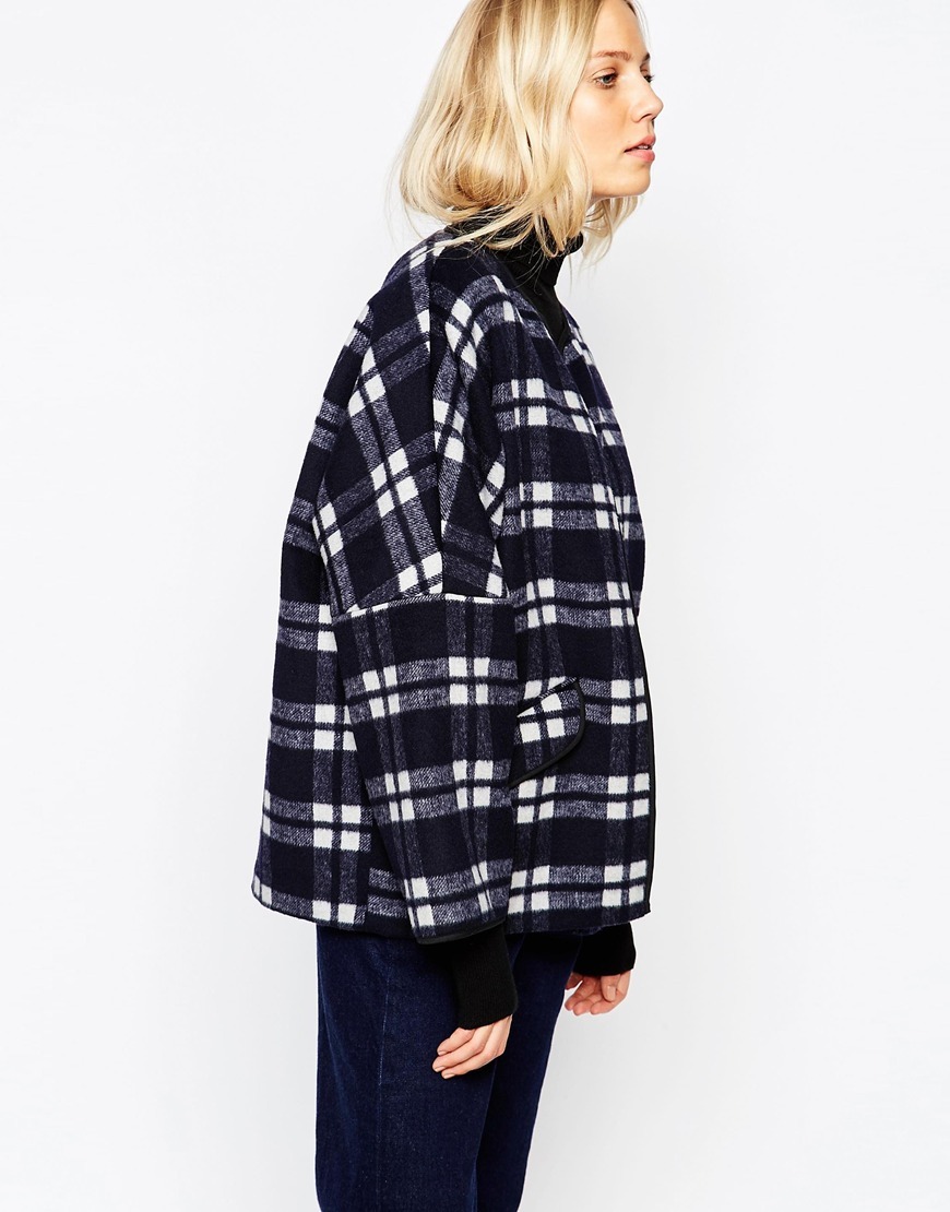 Katarina Coat In Wool Check Navy - sleeve style: dolman/batwing; pattern: checked/gingham; length: below the bottom; collar: funnel; style: parka; secondary colour: white; predominant colour: black; occasions: casual; fit: straight cut (boxy); fibres: wool - mix; sleeve length: long sleeve; collar break: high/illusion of break when open; pattern type: fabric; pattern size: standard; texture group: woven bulky/heavy; season: a/w 2015