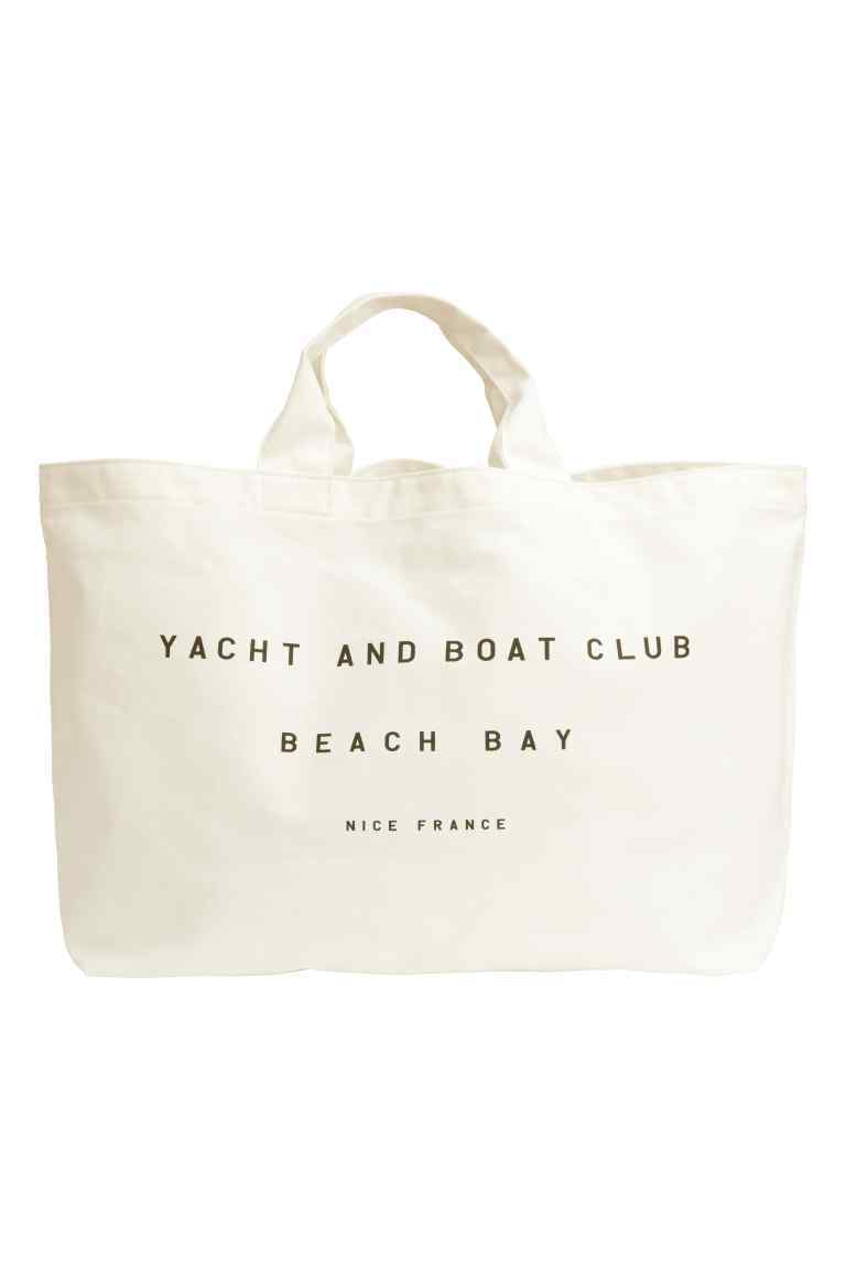 Tote Bag With A Text Print - predominant colour: ivory/cream; secondary colour: black; occasions: casual, holiday, creative work; type of pattern: standard; style: tote; length: shoulder (tucks under arm); size: oversized; material: faux leather; finish: plain; pattern: patterned/print; season: s/s 2016; wardrobe: highlight