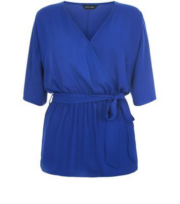 Blue Belted Wrap 1/2 Sleeve Top - neckline: v-neck; pattern: plain; style: wrap/faux wrap; waist detail: belted waist/tie at waist/drawstring; predominant colour: royal blue; occasions: casual, creative work; length: standard; fibres: polyester/polyamide - 100%; fit: body skimming; sleeve length: half sleeve; sleeve style: standard; pattern type: fabric; texture group: jersey - stretchy/drapey; season: s/s 2016; wardrobe: highlight