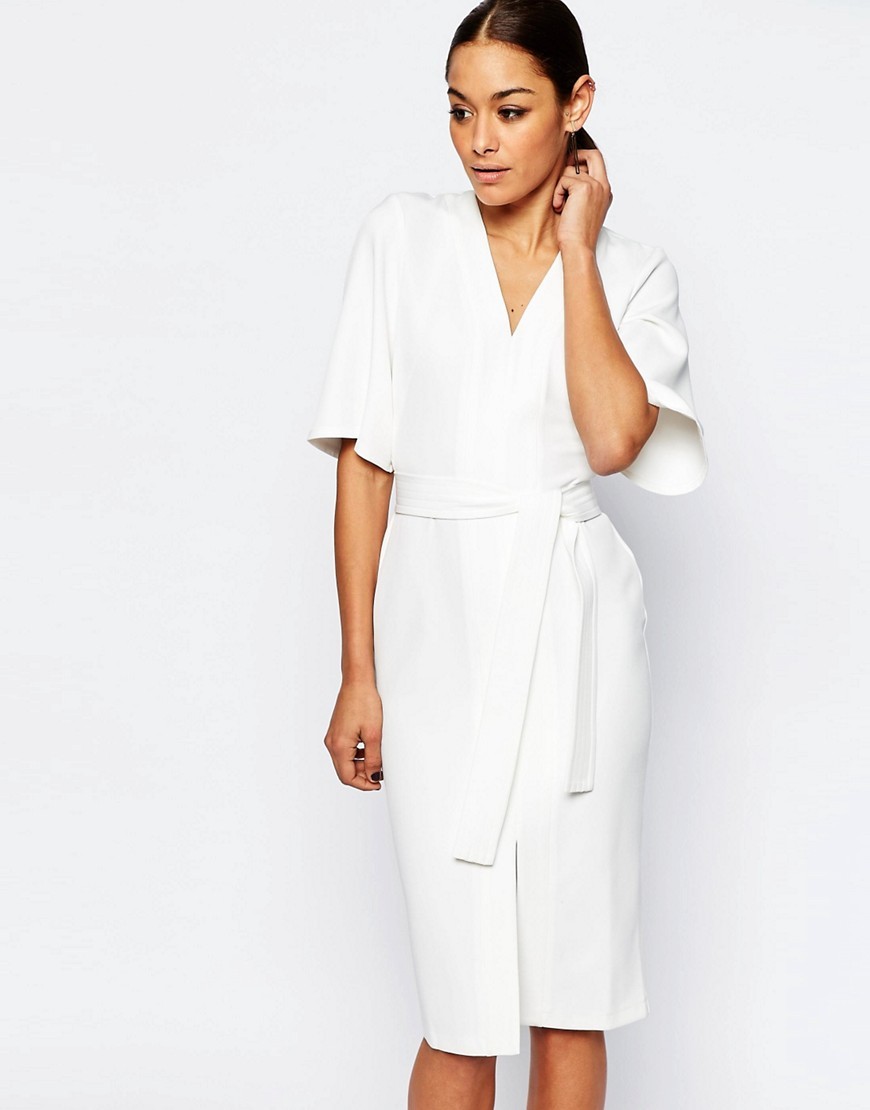 Clean Obi Wrap Dress With V Front Ivory - style: faux wrap/wrap; length: below the knee; neckline: v-neck; sleeve style: dolman/batwing; fit: tailored/fitted; pattern: plain; waist detail: belted waist/tie at waist/drawstring; predominant colour: ivory/cream; fibres: polyester/polyamide - 100%; occasions: occasion, creative work; sleeve length: half sleeve; texture group: crepes; pattern type: fabric; season: s/s 2016; wardrobe: investment