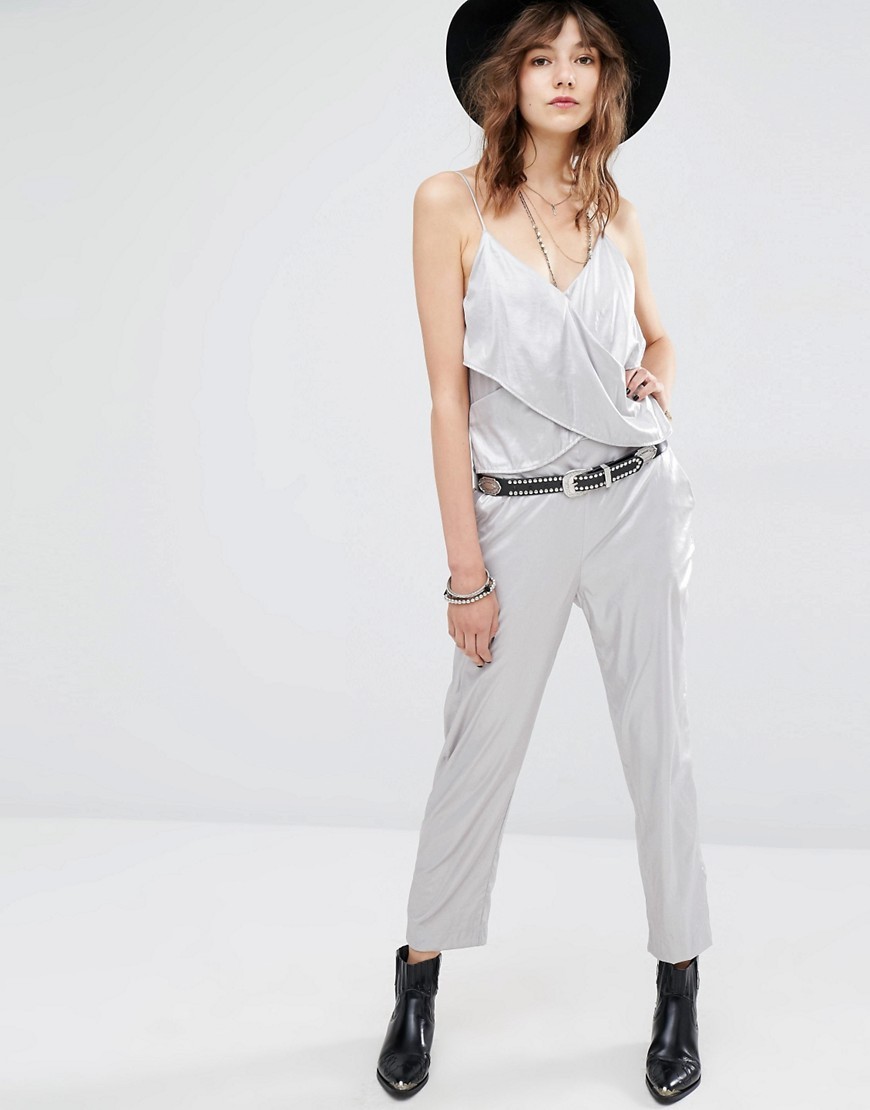 Silver Festival Jumpsuit Silver - length: standard; neckline: v-neck; fit: fitted at waist; pattern: plain; sleeve style: sleeveless; predominant colour: light grey; fibres: polyester/polyamide - 100%; occasions: occasion; sleeve length: sleeveless; style: jumpsuit; pattern type: fabric; texture group: other - light to midweight; season: s/s 2016; wardrobe: event