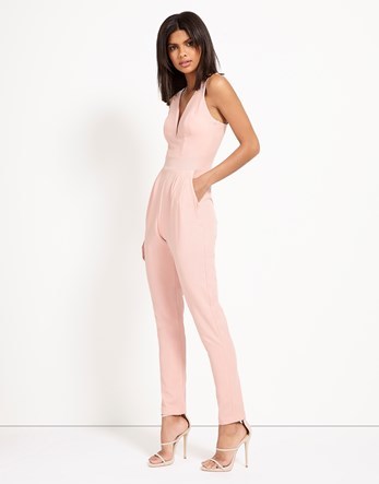 Plunge V Neck Jumpsuit - length: standard; neckline: v-neck; pattern: plain; sleeve style: sleeveless; predominant colour: blush; occasions: evening; fit: body skimming; fibres: cotton - 100%; sleeve length: sleeveless; texture group: cotton feel fabrics; style: jumpsuit; pattern type: fabric; season: s/s 2016; wardrobe: event