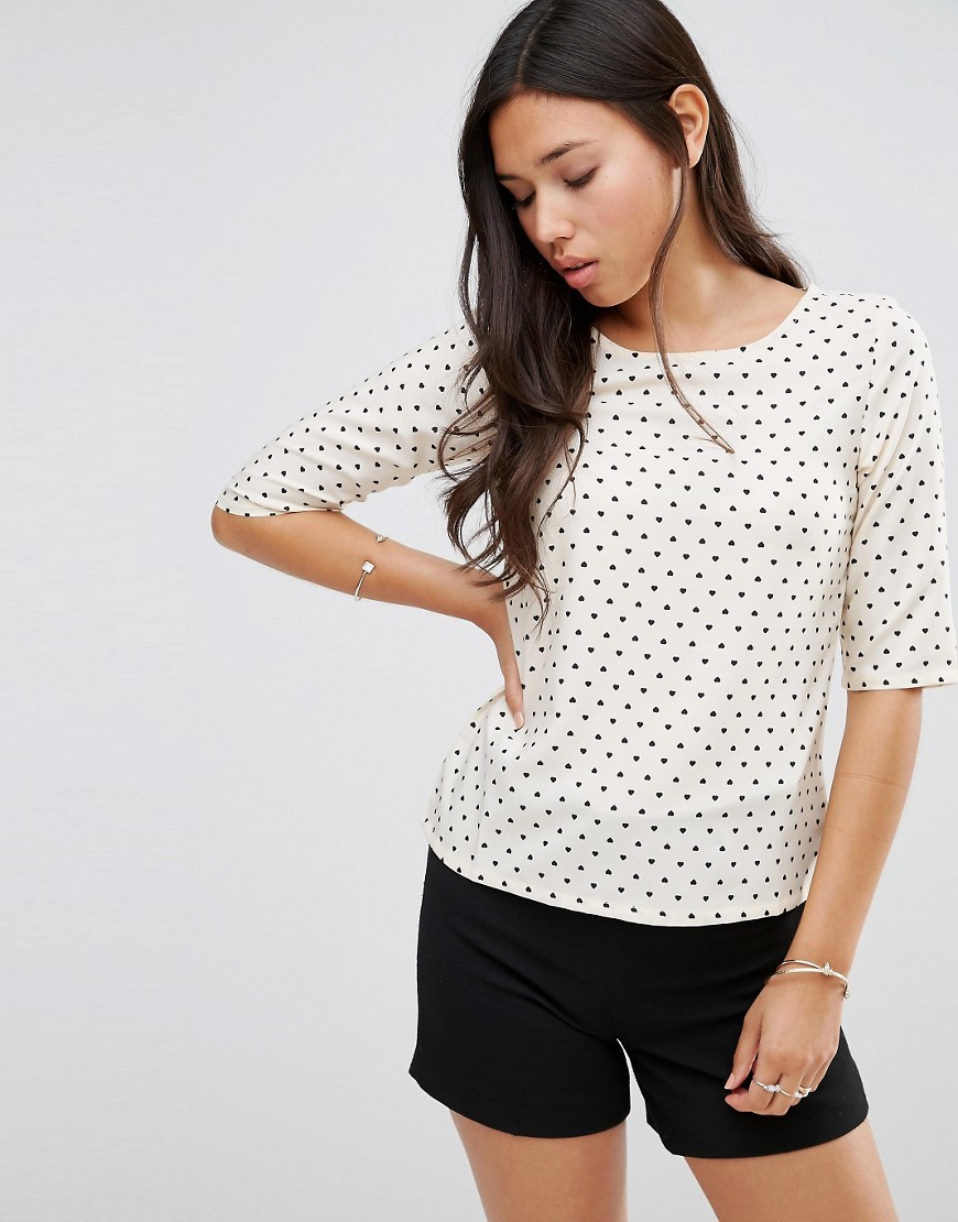 Polly Top Cream/Black - neckline: round neck; predominant colour: ivory/cream; secondary colour: black; occasions: casual, creative work; length: standard; style: top; fibres: polyester/polyamide - 100%; fit: body skimming; sleeve length: half sleeve; sleeve style: standard; pattern type: fabric; pattern size: standard; pattern: patterned/print; texture group: other - light to midweight; season: s/s 2016; wardrobe: highlight