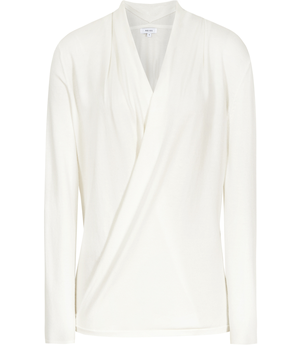 Fleur Womens Wrap Front Jumper In White - neckline: v-neck; pattern: plain; style: faux wrap/wrap; predominant colour: white; occasions: work, creative work; length: standard; fibres: wool - mix; fit: standard fit; sleeve length: long sleeve; sleeve style: standard; texture group: knits/crochet; pattern type: knitted - fine stitch; season: s/s 2016; wardrobe: basic