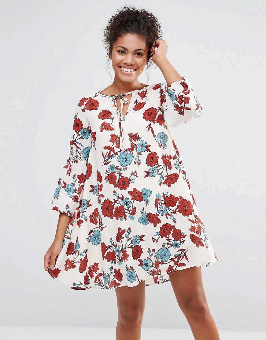 Floral Tie Neck Dress Cream - style: smock; length: mini; fit: loose; neckline: pussy bow; predominant colour: ivory/cream; secondary colour: terracotta; occasions: casual; fibres: polyester/polyamide - 100%; sleeve length: 3/4 length; sleeve style: standard; texture group: crepes; pattern type: fabric; pattern: florals; multicoloured: multicoloured; season: a/w 2016; wardrobe: highlight