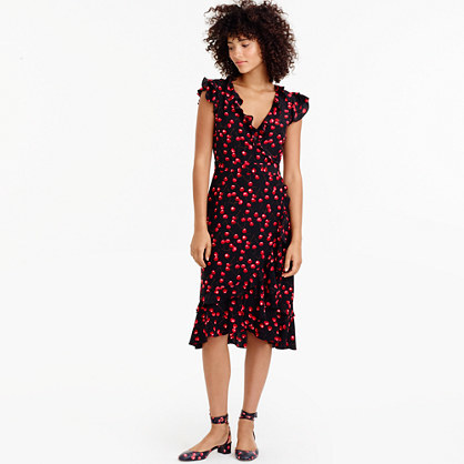 Silk Wrap Dress In Cherry Print - style: faux wrap/wrap; length: below the knee; neckline: v-neck; sleeve style: sleeveless; bust detail: subtle bust detail; secondary colour: true red; predominant colour: black; occasions: evening; fit: body skimming; fibres: silk - 100%; hip detail: subtle/flattering hip detail; sleeve length: sleeveless; texture group: silky - light; pattern type: fabric; pattern size: standard; pattern: patterned/print; season: a/w 2016; wardrobe: event