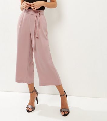 Mid Pink Tie Waist Culottes - pattern: plain; style: palazzo; waist: high rise; waist detail: belted waist/tie at waist/drawstring; predominant colour: blush; occasions: casual, creative work; length: calf length; fibres: polyester/polyamide - stretch; texture group: crepes; fit: wide leg; pattern type: fabric; wardrobe: basic; season: a/w 2016