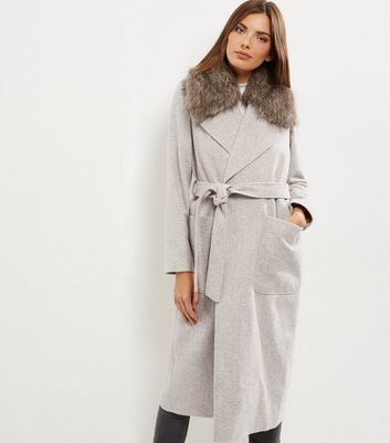 Cream Faux Fur Collar Belted Longline Coat - pattern: plain; back detail: hood; style: wrap around; predominant colour: light grey; occasions: casual; fit: tailored/fitted; fibres: polyester/polyamide - mix; length: below the knee; waist detail: belted waist/tie at waist/drawstring; sleeve length: long sleeve; sleeve style: standard; collar: fur; collar break: medium; pattern type: fabric; texture group: woven bulky/heavy; wardrobe: basic; season: a/w 2016