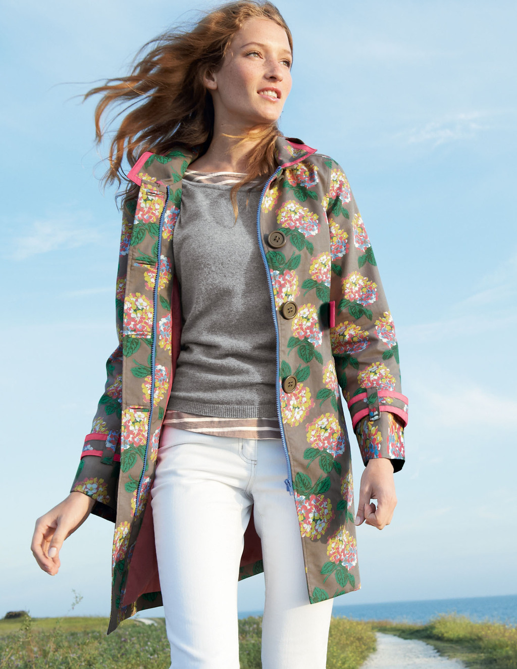 Rainyday Mac - pattern: floral - busy, florals; style: mac; hip detail: front pockets at hip; collar: hooded with opening; length: mid thigh; predominant colour: mid grey; occasions: casual; fit: straight cut (boxy); trends: prints; fibres: cotton - 100%; sleeve length: long sleeve; sleeve style: standard; pattern type: fabric; pattern size: small & busy