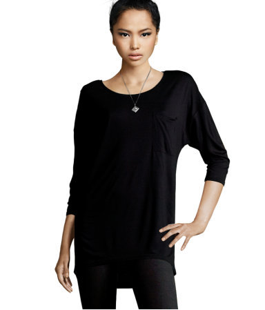 Top - pattern: plain; bust detail: added detail/embellishment at bust; length: below the bottom; predominant colour: black; occasions: casual; style: top; neckline: scoop; fibres: polyester/polyamide - 100%; material texture: jersey; fit: loose; back detail: longer hem at back than at front; sleeve length: 3/4 length; sleeve style: standard; pattern type: fabric; pattern size: standard; texture group: jersey - stretchy/drapey