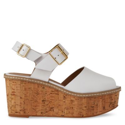 Penelope Buckle Wedge Sandals - predominant colour: white; material: suede; heel height: high; embellishment: buckles; ankle detail: ankle strap; heel: wedge; toe: open toe/peeptoe; style: standard