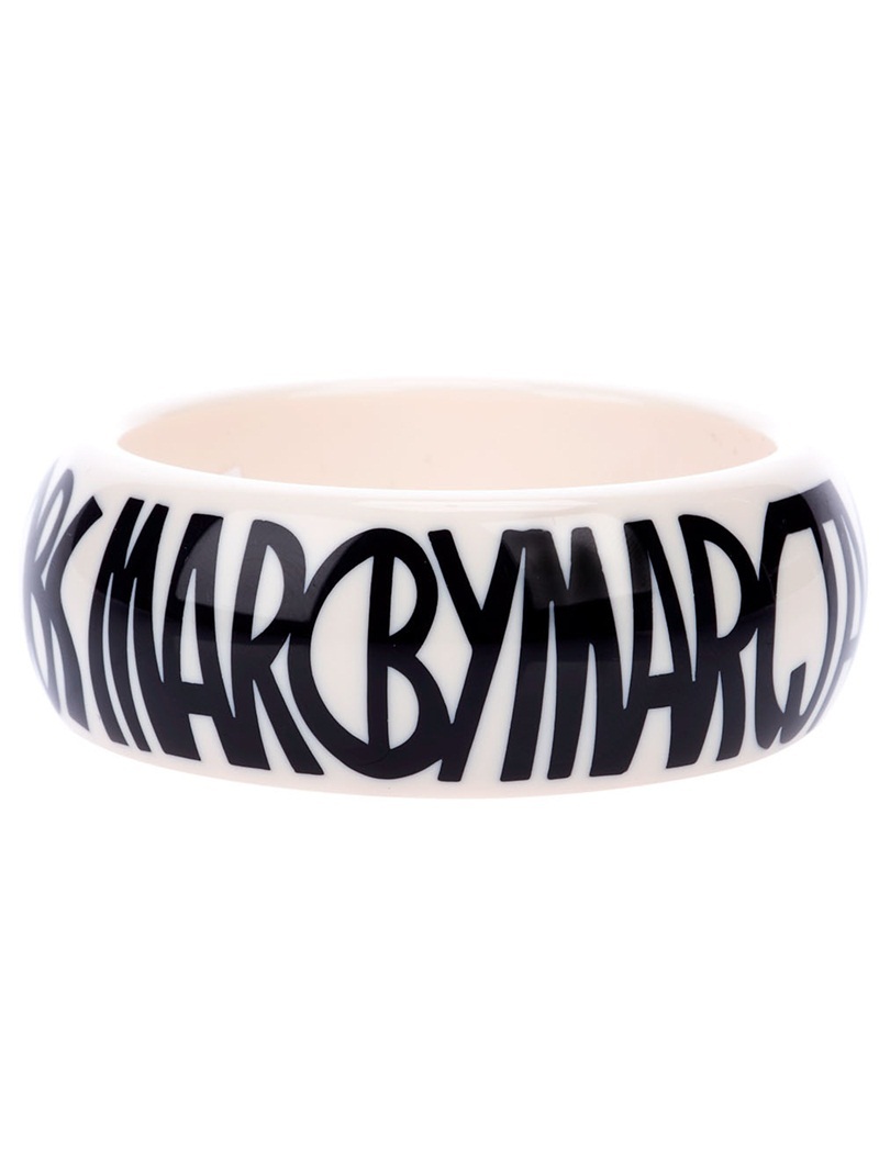 'Jacobson' Logo Bangle - predominant colour: white; style: bangle; size: large/oversized; material: plastic/rubber