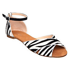 Jupiterd Animal Print Pony Flat Sandal - predominant colour: black; material: leather; heel height: flat; embellishment: animal print, buckles; ankle detail: ankle strap; heel: standard; toe: open toe/peeptoe; style: standard; pattern: animal print