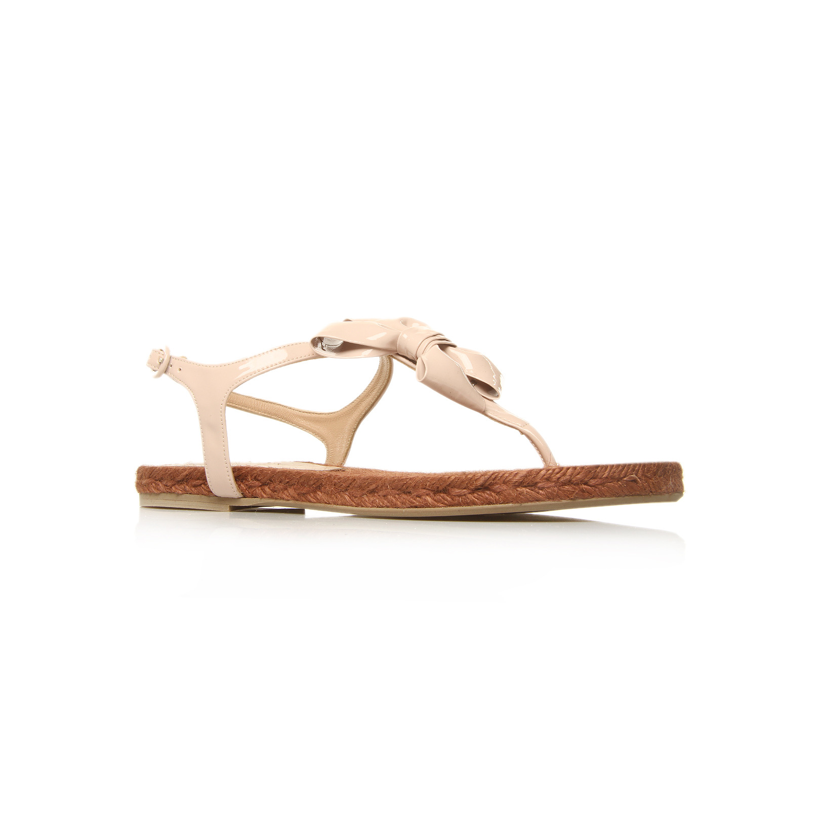 Flor - predominant colour: ivory; material: faux leather; heel height: flat; embellishment: buckles, ribbon; ankle detail: ankle strap; heel: standard; toe: toe thongs; style: flip flops / toe post