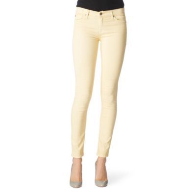 Sorbet Skinny Jeans - style: skinny leg; pattern: plain; pocket detail: traditional 5 pocket; waist: mid/regular rise; predominant colour: primrose yellow; occasions: casual; length: ankle length; fibres: cotton - mix; material texture: denim; trends: pastels; texture group: denim; pattern type: fabric; pattern size: standard