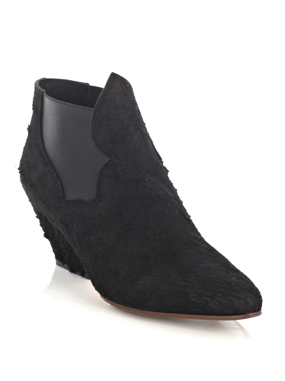 Alma Boots - predominant colour: black; material: suede; heel height: mid; embellishment: elasticated; heel: block; toe: pointed toe; boot length: ankle boot; style: standard