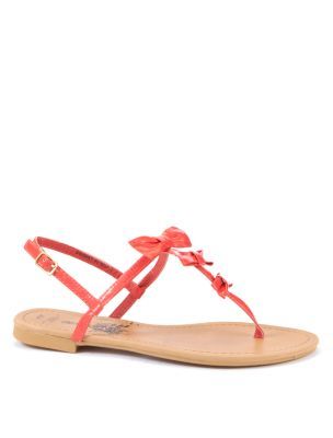 Coral Patent Bow Sandals - predominant colour: coral; material: patent; heel height: flat; embellishment: buckles; ankle detail: ankle strap; heel: block; toe: toe thongs; style: flip flops / toe post; finish: patent