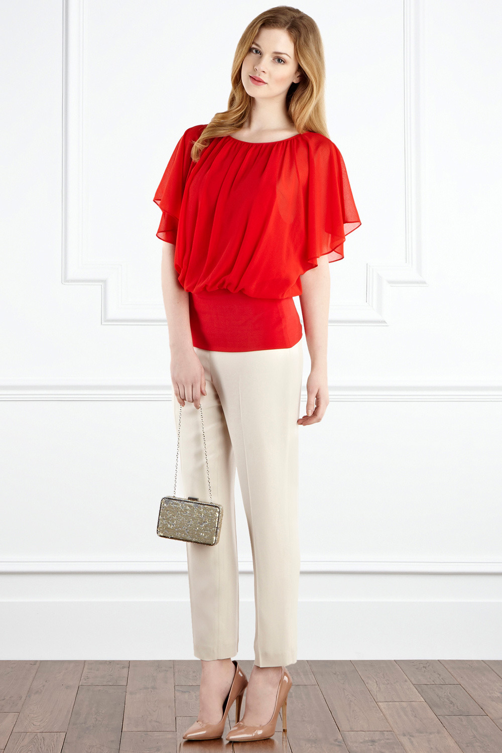 Calla Top - sleeve style: angel/waterfall; pattern: plain; waist detail: elasticated waist, wide waistband/cummerbund; shoulder detail: tiers/frills/ruffles, flat/draping pleats/ruching/gathering at shoulder; hip detail: fitted at hip, fitted hem at hip; bust detail: ruching/gathering/draping/layers/pintuck pleats at bust; predominant colour: bright orange; occasions: casual, evening, work; length: standard; style: top; fibres: polyester/polyamide - mix; material texture: chiffon; fit: body skimming; neckline: crew; trends: brights; sleeve length: short sleeve; texture group: sheer fabrics/chiffon/organza etc.; pattern type: fabric; pattern size: standard