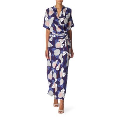 Glennis Wrap Dress - style: faux wrap/wrap; neckline: v-neck; pattern: floral - busy, abstract, florals, patterned/print; waist detail: belted waist/tie at waist/drawstring; bust detail: ruching/gathering/draping/layers/pintuck pleats at bust; predominant colour: royal blue; occasions: casual, evening; length: floor length; fit: body skimming; fibres: silk - 100%; material texture: satin; trends: prints; sleeve length: short sleeve; sleeve style: standard; texture group: structured shiny - satin/tafetta/silk etc.; pattern type: fabric; pattern size: small & busy