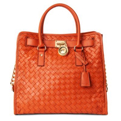 Hamilton Woven Large Tote - predominant colour: bright orange; type of pattern: standard; style: tote; length: shoulder (tucks under arm); size: standard; material: leather; embellishment: quilted, studs, tassels; pattern: monogram, plain