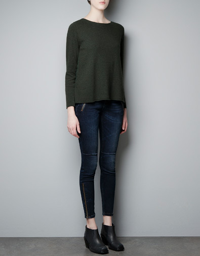 Sweater With Pleated Chiffon Back - neckline: round neck; pattern: plain; style: standard; back detail: contrast pattern/fabric at back; predominant colour: dark green; occasions: casual; length: standard; fibres: nylon - mix; fit: loose; hip detail: dip hem; sleeve length: long sleeve; sleeve style: standard; trends: deep tones; texture group: knits/crochet; pattern type: knitted - other; pattern size: standard; season: a/w 2012