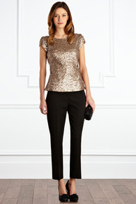 Rosamund Top - neckline: round neck; sleeve style: capped; pattern: plain; back detail: low cut/open back; predominant colour: gold; occasions: evening, work, occasion; length: standard; style: top; fibres: viscose/rayon - 100%; fit: tailored/fitted; shoulder detail: flat/draping pleats/ruching/gathering at shoulder; sleeve length: short sleeve; trends: metallics; pattern type: fabric; pattern size: small & busy; texture group: other - light to midweight; embellishment: sequins