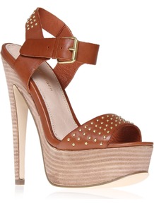 Martini - predominant colour: tan; occasions: casual, evening, occasion, holiday; material: leather; heel height: high; embellishment: studs; ankle detail: ankle strap; heel: platform; toe: open toe/peeptoe; style: standard; finish: plain; pattern: plain