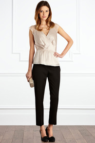 Traviata Top - neckline: low v-neck; sleeve style: capped; pattern: plain; style: wrap/faux wrap; shoulder detail: contrast pattern/fabric at shoulder; waist detail: peplum waist detail; bust detail: ruching/gathering/draping/layers/pintuck pleats at bust; predominant colour: champagne; occasions: evening, occasion; length: standard; fibres: silk - mix; fit: tailored/fitted; sleeve length: short sleeve; texture group: structured shiny - satin/tafetta/silk etc.; pattern type: fabric; pattern size: standard