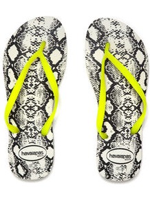 Slim Animals Fluo - predominant colour: yellow; occasions: casual, holiday; material: plastic/rubber; heel height: flat; heel: standard; toe: toe thongs; style: flip flops / toe post; trends: statement prints, fluorescent; finish: fluorescent; pattern: animal print