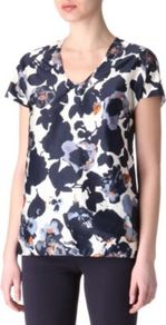 Floral Print Top - neckline: v-neck; secondary colour: white; predominant colour: navy; occasions: casual, evening, work; length: standard; style: top; fibres: silk - mix; fit: body skimming; sleeve length: short sleeve; sleeve style: standard; texture group: silky - light; trends: high impact florals; pattern type: fabric; pattern size: big & busy; pattern: florals
