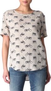 Riley Motorcycle Printed Top - style: t-shirt; predominant colour: stone; secondary colour: charcoal; occasions: casual; length: standard; fibres: silk - 100%; fit: body skimming; neckline: crew; back detail: longer hem at back than at front; sleeve length: short sleeve; sleeve style: standard; texture group: silky - light; pattern type: fabric; pattern size: small & busy; pattern: patterned/print