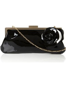 Black Patent Bex Large Flower Corsage Clutch Bag - predominant colour: black; occasions: evening, occasion; type of pattern: standard; style: clutch; length: hand carry; size: small; material: leather; pattern: plain; finish: patent; embellishment: corsage