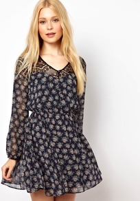 Skater Dress With Floral Print - length: mid thigh; neckline: v-neck; fit: fitted at waist; waist detail: fitted waist; predominant colour: navy; occasions: casual, evening; style: fit & flare; fibres: polyester/polyamide - 100%; sleeve length: long sleeve; sleeve style: standard; texture group: sheer fabrics/chiffon/organza etc.; pattern type: fabric; pattern size: small & busy; pattern: patterned/print