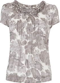 Dalilah Blouse, Silver - neckline: round neck; bust detail: ruching/gathering/draping/layers/pintuck pleats at bust; secondary colour: white; predominant colour: mid grey; occasions: evening; length: standard; style: top; fibres: polyester/polyamide - 100%; fit: straight cut; sleeve length: short sleeve; sleeve style: standard; texture group: sheer fabrics/chiffon/organza etc.; pattern type: fabric; pattern size: standard; pattern: florals