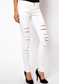 Ripped Skinny Jean - style: skinny leg; length: standard; pattern: plain; pocket detail: traditional 5 pocket; waist: mid/regular rise; predominant colour: white; occasions: casual; fibres: cotton - stretch; texture group: denim; pattern type: fabric; pattern size: small & light