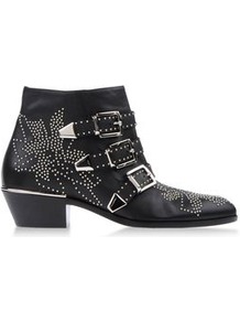 Boots Ankle Boots On Shoescribe.Com - predominant colour: black; occasions: casual, work; material: leather; heel height: mid; embellishment: studs; heel: block; toe: round toe; boot length: ankle boot; style: cowboy; finish: plain; pattern: plain
