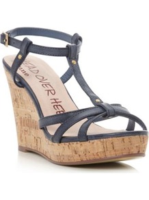 Navy Gelz T Bar Cork Wedge Sandal - predominant colour: navy; secondary colour: camel; occasions: casual, evening, holiday; material: faux leather; heel height: high; embellishment: studs; ankle detail: ankle strap; heel: wedge; toe: open toe/peeptoe; style: strappy; finish: plain; pattern: plain