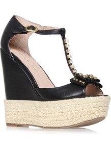 Nimes - predominant colour: black; occasions: evening, holiday; material: leather; embellishment: studs; ankle detail: ankle strap; heel: platform; toe: open toe/peeptoe; style: t-bar; finish: plain; pattern: plain; heel height: very high