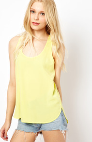Sporty Vest - pattern: plain; sleeve style: sleeveless; style: vest top; predominant colour: primrose yellow; occasions: casual, holiday; length: standard; neckline: scoop; fibres: polyester/polyamide - 100%; fit: loose; shoulder detail: added shoulder detail; back detail: longer hem at back than at front; sleeve length: sleeveless; texture group: sheer fabrics/chiffon/organza etc.; pattern type: fabric