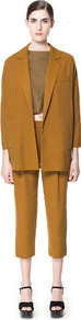 Oversized Flowing Blazer - pattern: plain; style: single breasted blazer; hip detail: side pockets at hip; fit: loose; collar: standard lapel/rever collar; predominant colour: mustard; occasions: casual, work; length: standard; fibres: polyester/polyamide - 100%; sleeve length: 3/4 length; sleeve style: standard; collar break: low/open; pattern type: fabric; texture group: woven light midweight