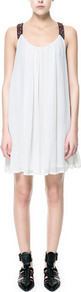 Flowing Dress With Embellished Straps - style: smock; sleeve style: standard vest straps/shoulder straps; fit: loose; back detail: racer back/sports back; predominant colour: white; occasions: casual, evening, occasion; length: just above the knee; neckline: scoop; fibres: polyester/polyamide - 100%; hip detail: soft pleats at hip/draping at hip/flared at hip; shoulder detail: added shoulder detail; sleeve length: sleeveless; texture group: sheer fabrics/chiffon/organza etc.; pattern type: fabric; pattern size: small & light; embellishment: beading