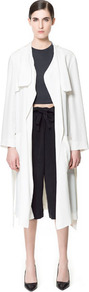 Long Flowing Trench Coat - pattern: plain; collar: wide lapels; fit: loose; style: single breasted; length: calf length; predominant colour: white; occasions: casual, evening, work, occasion; fibres: polyester/polyamide - 100%; waist detail: belted waist/tie at waist/drawstring; back detail: back vent/flap at back; sleeve length: long sleeve; sleeve style: standard; collar break: low/open; pattern type: fabric; texture group: jersey - stretchy/drapey