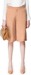 Culotte Trousers With Waistband - pattern: plain; style: culotte; fit: loose/voluminous; waist: mid/regular rise; predominant colour: camel; occasions: casual, work, occasion; length: on the knee; fibres: polyester/polyamide - 100%; waist detail: narrow waistband; texture group: crepes; pattern type: fabric