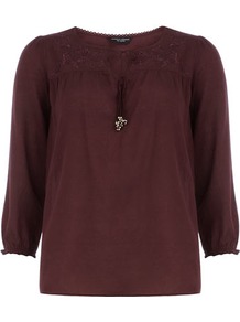 Burgundy Embroidered Smock Top - neckline: v-neck; pattern: plain; bust detail: added detail/embellishment at bust; style: blouse; shoulder detail: contrast pattern/fabric at shoulder; predominant colour: burgundy; occasions: casual, work; length: standard; fibres: cotton - 100%; fit: straight cut; sleeve length: 3/4 length; sleeve style: standard; texture group: cotton feel fabrics; pattern type: fabric; pattern size: standard