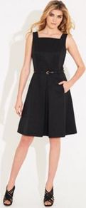 Black Belted Paddington Dress - neckline: high square neck; pattern: plain; sleeve style: sleeveless; back detail: low cut/open back; waist detail: structured pleats at waist; predominant colour: black; occasions: evening, occasion; length: on the knee; fit: fitted at waist & bust; style: fit & flare; fibres: cotton - mix; sleeve length: sleeveless; trends: volume; pattern type: fabric; texture group: other - light to midweight