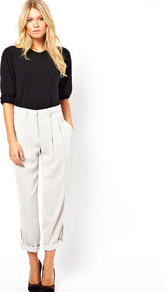 Trousers With Ankle Tab Detail - pattern: plain; style: capri; waist detail: fitted waist; pocket detail: small back pockets, pockets at the sides; waist: mid/regular rise; predominant colour: ivory; occasions: casual, evening, work, holiday; length: ankle length; fibres: polyester/polyamide - 100%; hip detail: front pleats at hip level; jeans & bottoms detail: turn ups; texture group: crepes; fit: straight leg; pattern type: fabric