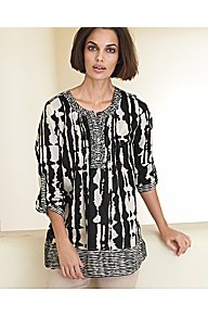 Abstract Print Blouse - neckline: round neck; sleeve style: bell sleeve; length: below the bottom; style: tunic; shoulder detail: contrast pattern/fabric at shoulder; bust detail: ruching/gathering/draping/layers/pintuck pleats at bust; predominant colour: black; occasions: casual, evening, work, holiday; fibres: cotton - 100%; fit: loose; sleeve length: 3/4 length; texture group: cotton feel fabrics; trends: modern geometrics; pattern type: fabric; pattern size: big & busy; pattern: patterned/print