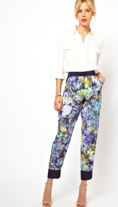 Trousers In Soft Floral Print - pocket detail: large back pockets, pockets at the sides; waist detail: wide waistband/cummerbund; waist: high rise; secondary colour: black; occasions: evening, work, holiday; length: ankle length; fibres: polyester/polyamide - 100%; hip detail: added detail/embellishment at hip; jeans & bottoms detail: turn ups; predominant colour: multicoloured; texture group: silky - light; trends: high impact florals; fit: straight leg; pattern type: fabric; pattern size: big & busy; pattern: florals; style: standard