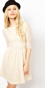 Lace Skater Dress - length: mid thigh; neckline: round neck; pattern: plain; waist detail: fitted waist; predominant colour: ivory; occasions: evening, occasion, holiday; fit: fitted at waist & bust; style: fit & flare; hip detail: ruching/gathering at hip; sleeve length: 3/4 length; sleeve style: standard; texture group: lace; pattern type: fabric; fibres: nylon - stretch; embellishment: lace
