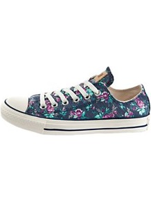 Chuck Taylor All Star Ox Floral Print Plimsolls - predominant colour: navy; occasions: casual, holiday; material: fabric; heel height: flat; toe: round toe; style: trainers; trends: high impact florals; finish: plain; pattern: florals